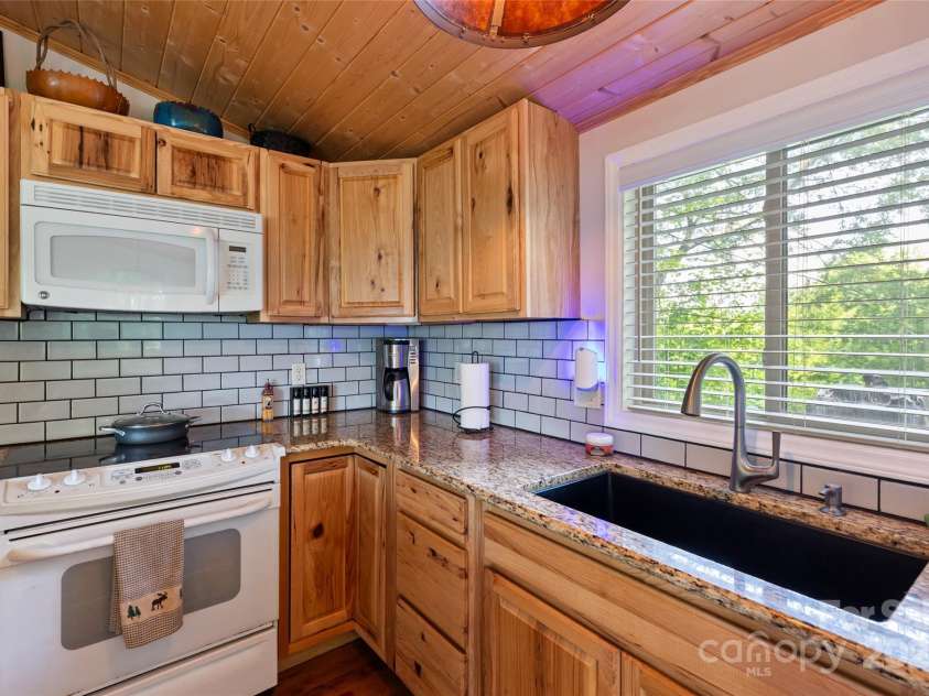 56 Faraway Drive, Cullowhee, NC 28723.  MLS# CAR4272041, YatesRealty ID 20362. 