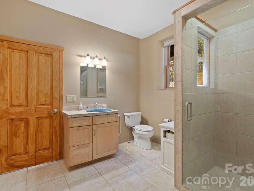 97 Old Cove Road, Black Mountain, NC 28711.  MLS# CAR4359155, YatesRealty ID 20366. 2nd floor bathroom