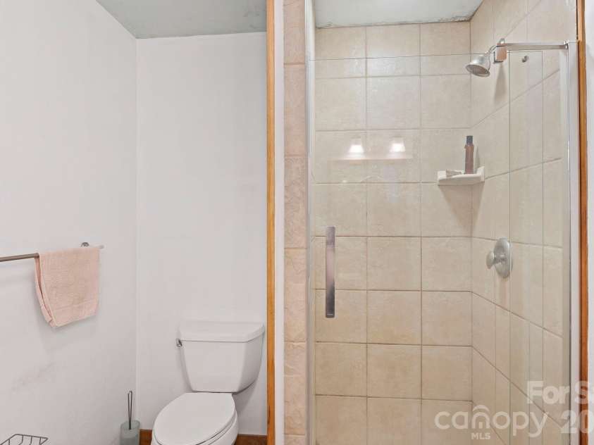 97 Old Cove Road, Black Mountain, NC 28711.  MLS# CAR4359155, YatesRealty ID 20366. Basement bathroom