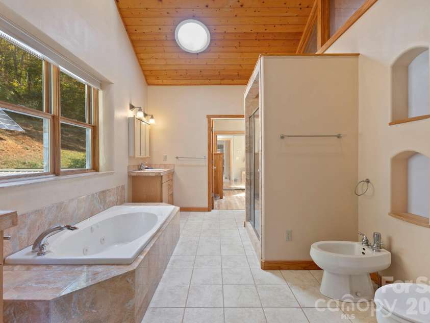 97 Old Cove Road, Black Mountain, NC 28711.  MLS# CAR4359155, YatesRealty ID 20366. Main floor bathroom