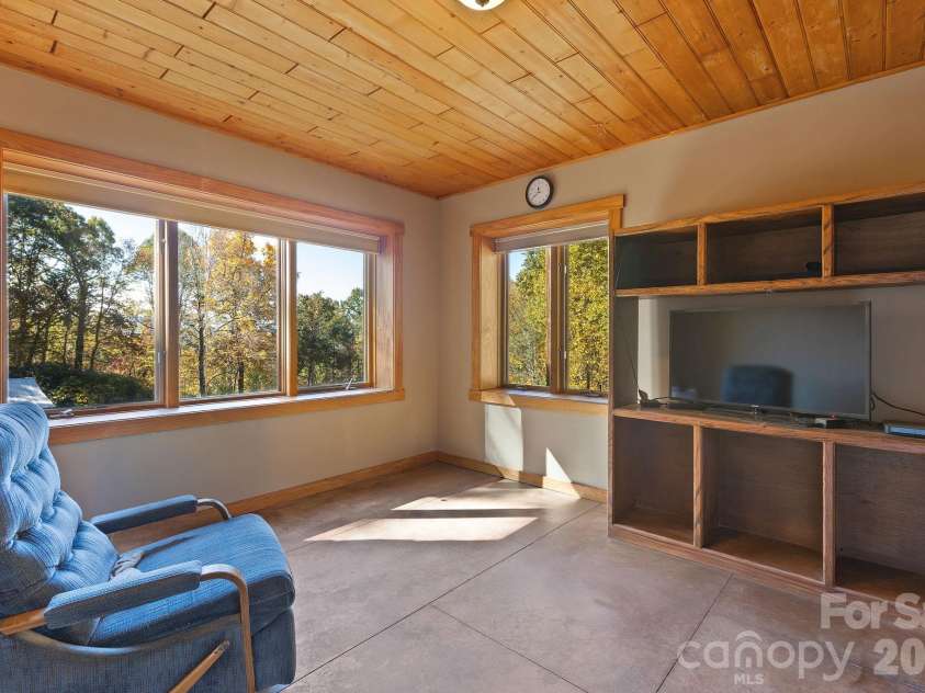 97 Old Cove Road, Black Mountain, NC 28711.  MLS# CAR4359155, YatesRealty ID 20366. Media/flex room in basement
