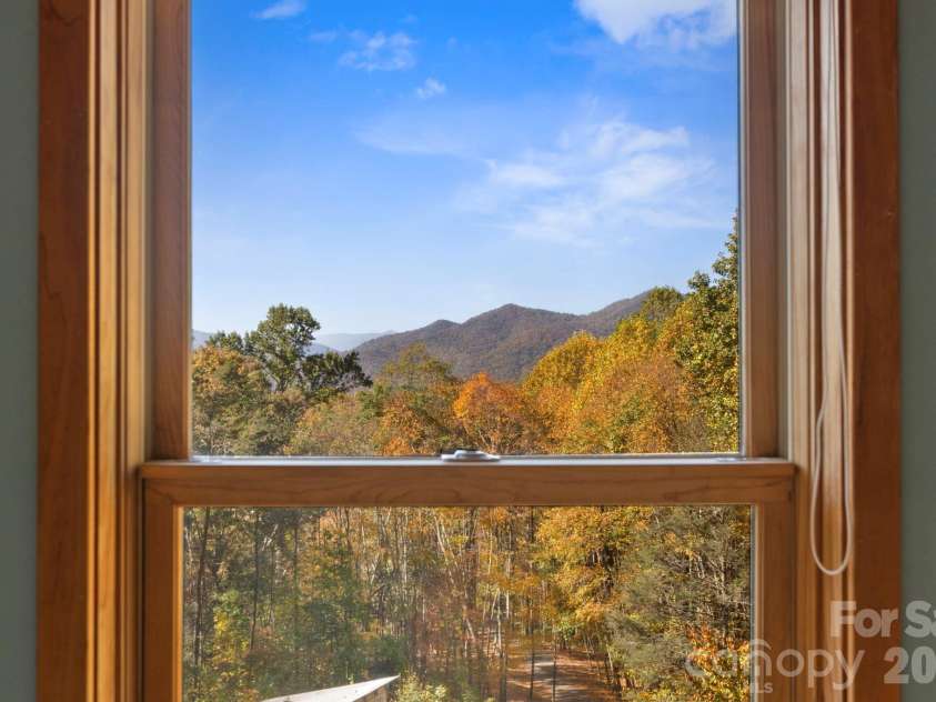 97 Old Cove Road, Black Mountain, NC 28711.  MLS# CAR4359155, YatesRealty ID 20366. So many window view opportunities for see the mountains