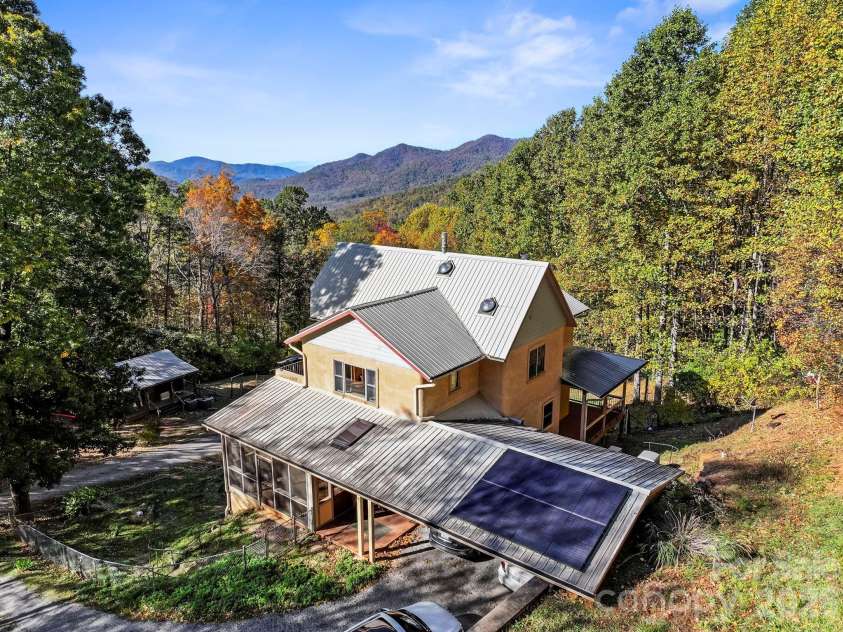 97 Old Cove Road, Black Mountain, NC 28711.  MLS# CAR4359155, YatesRealty ID 20366. Solar array on roof