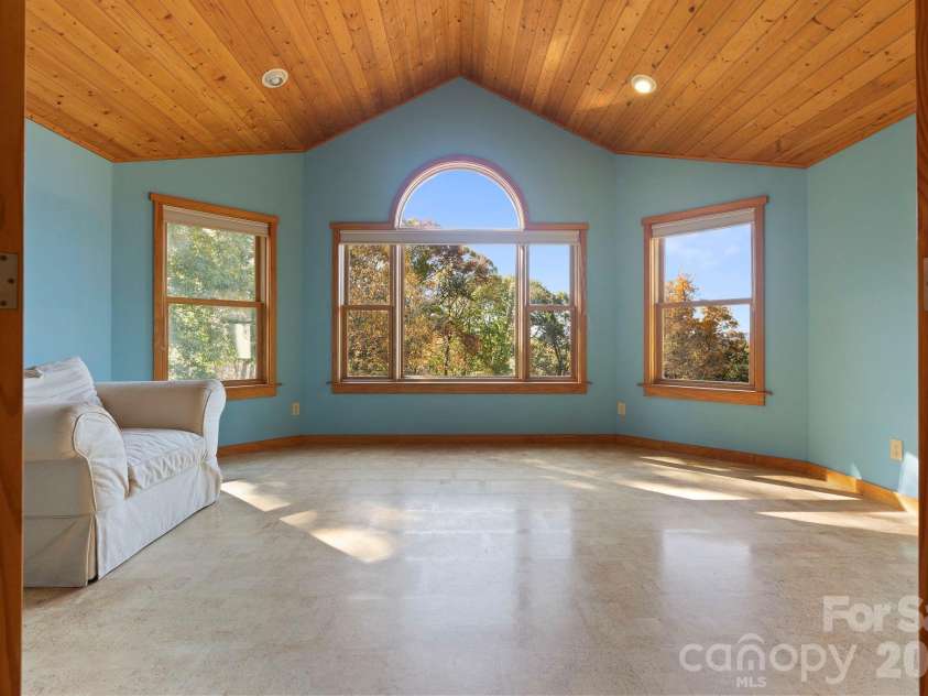 97 Old Cove Road, Black Mountain, NC 28711.  MLS# CAR4359155, YatesRealty ID 20366. Sunroom on 2nd floor with mountain view