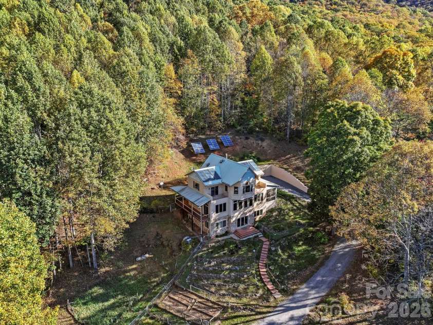 97 Old Cove Road, Black Mountain, NC 28711.  MLS# CAR4359155, YatesRealty ID 20366. Surrounded by nature