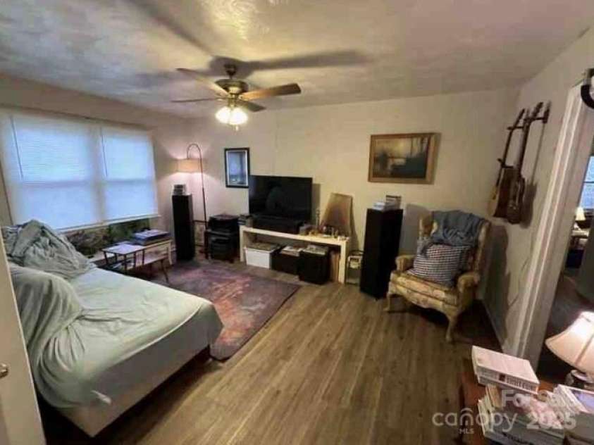 910 McGowan Road, Shelby, NC 28150.  MLS# CAR4251962, YatesRealty ID 20367. Family room w/ LVP flooring