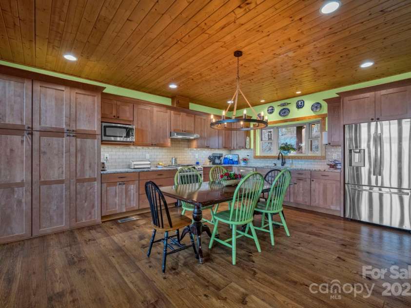 146 Sarinac Drive, Bostic, NC 28018.  MLS# CAR4327091, YatesRealty ID 2037. Maple cabinetry, granite counterops, subway tile backsplash