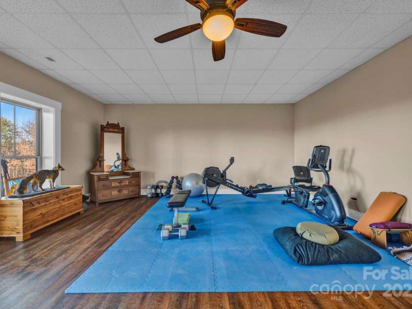 146 Sarinac Drive, Bostic, NC 28018.  MLS# CAR4327091, YatesRealty ID 2037. This owner takes advantage of the views from this room while exercising