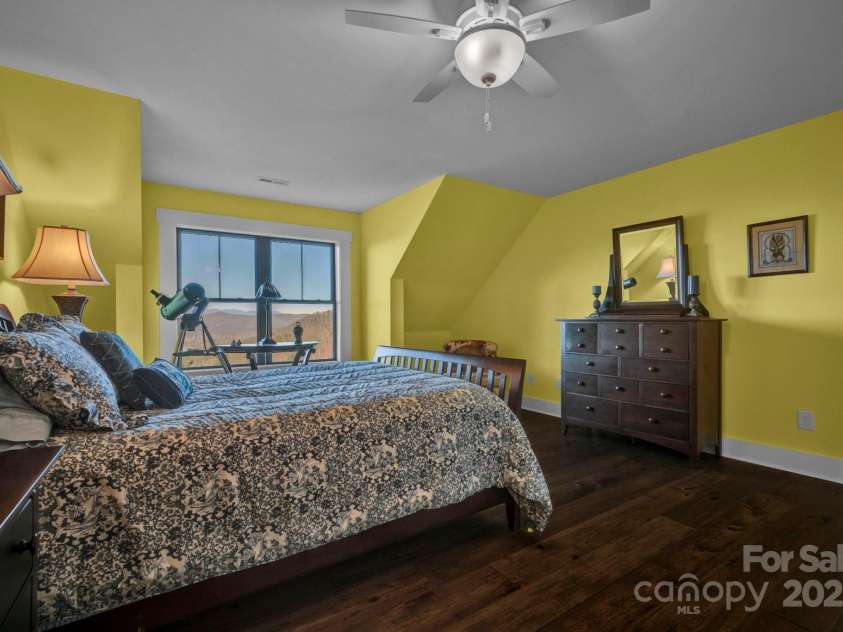 146 Sarinac Drive, Bostic, NC 28018.  MLS# CAR4327091, YatesRealty ID 2037. Two spacious 2nd floor guest rooms. This room offers mountain views