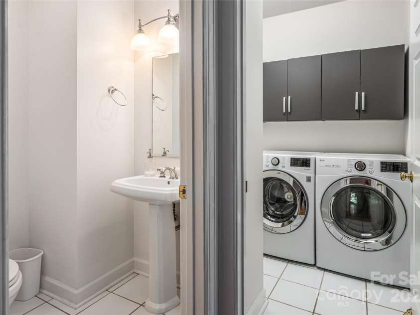 54 Fairway Road, Asheville, NC 28804.  MLS# CAR4238244, YatesRealty ID 2037. 1/2 Bath on Left. Separate Laundry Room on Right