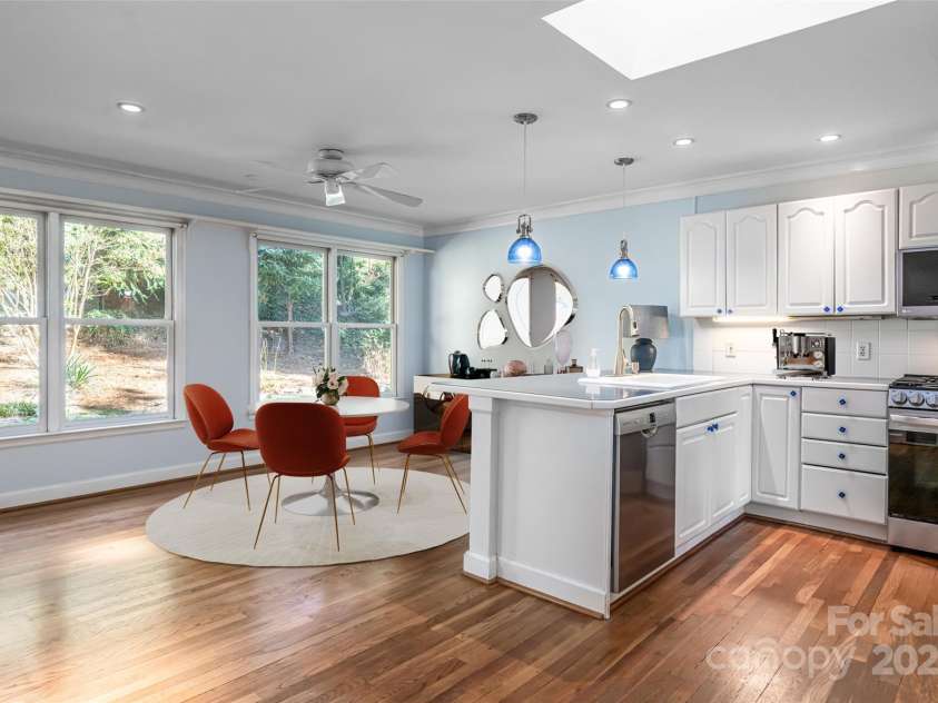 54 Fairway Road, Asheville, NC 28804.  MLS# CAR4238244, YatesRealty ID 2037. Kitchen with eat in breakfast area.