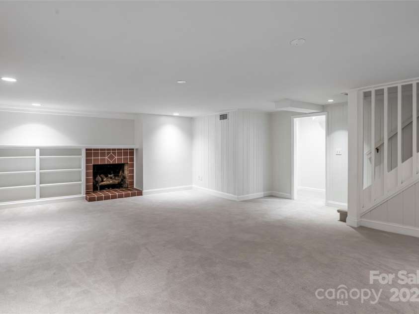 54 Fairway Road, Asheville, NC 28804.  MLS# CAR4238244, YatesRealty ID 2037. Lower Level Bonus Room - View #2