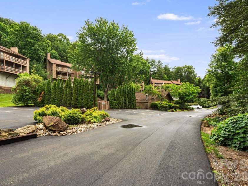 305 Piney Mountain Drive, Asheville, NC 28805.  MLS# CAR4380545, YatesRealty ID 20378. Community access
