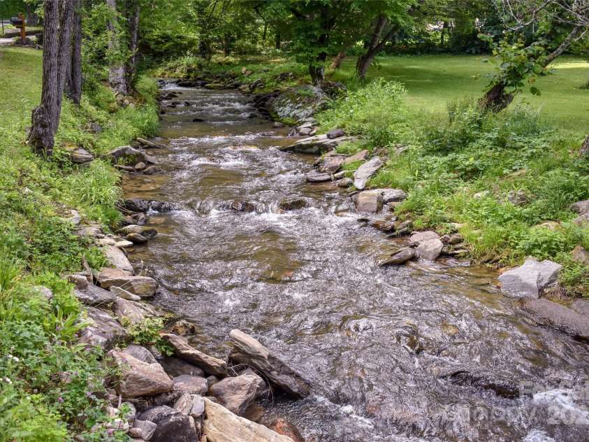 3435 Conleys Creek Road, Whittier, NC 28789.  MLS# CAR4272646, YatesRealty ID 20379. Across the road