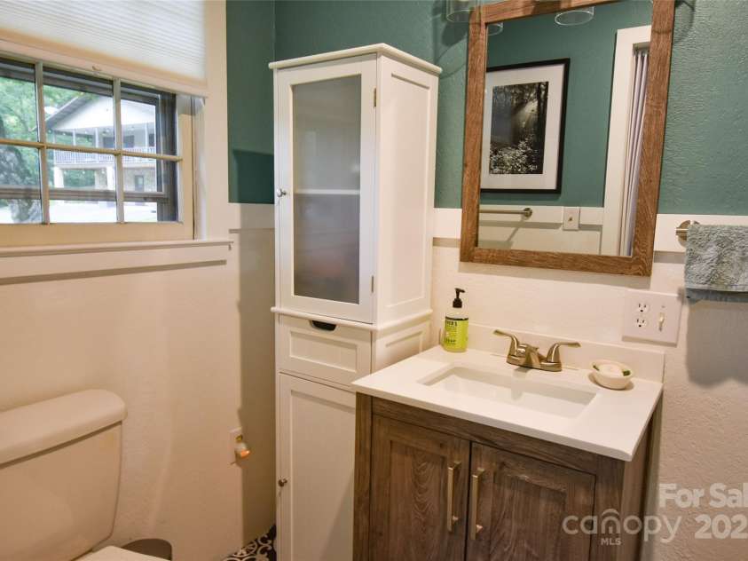 3435 Conleys Creek Road, Whittier, NC 28789.  MLS# CAR4272646, YatesRealty ID 20379. Cute Bathroom