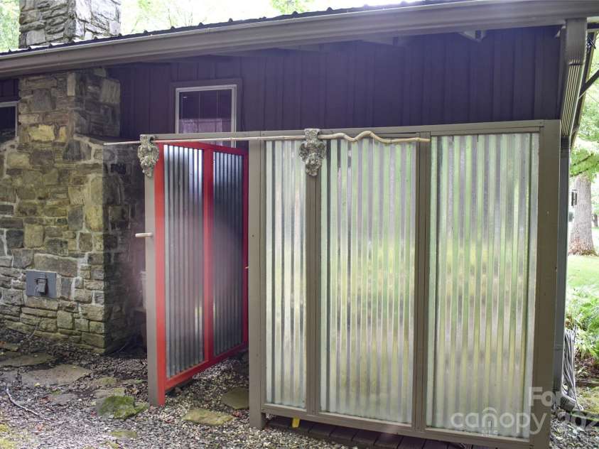 3435 Conleys Creek Road, Whittier, NC 28789.  MLS# CAR4272646, YatesRealty ID 20379. Outdoor shower