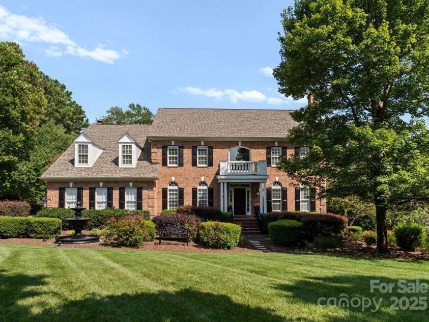 239 Kimberly Road, Davidson, NC 28036.  MLS# CAR4288776, YatesRealty ID 2038. Beautiful setting and curb appeal