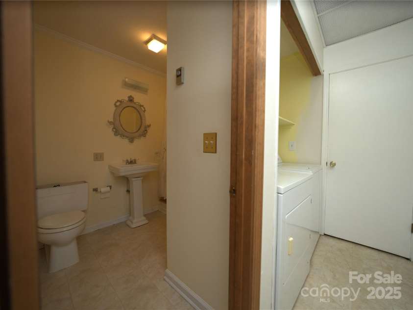 218 McGuffey Ridge Ridge, Gerton, NC 28735.  MLS# CAR4268730, YatesRealty ID 20383. Second bath/laundry 