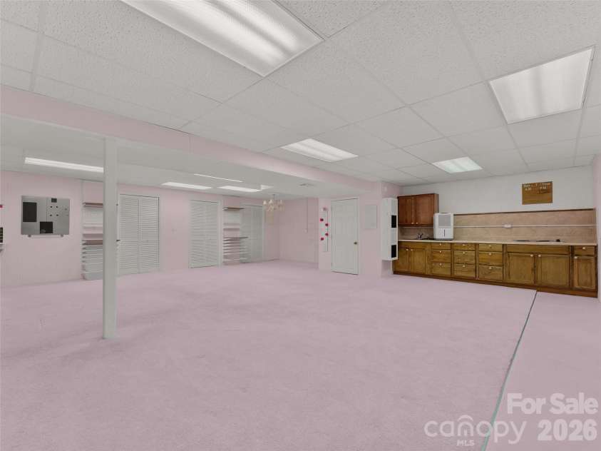 476 Jackson Loop Road, Flat Rock, NC 28731.  MLS# CAR4363362, YatesRealty ID 20386. Basement w/kitchenette