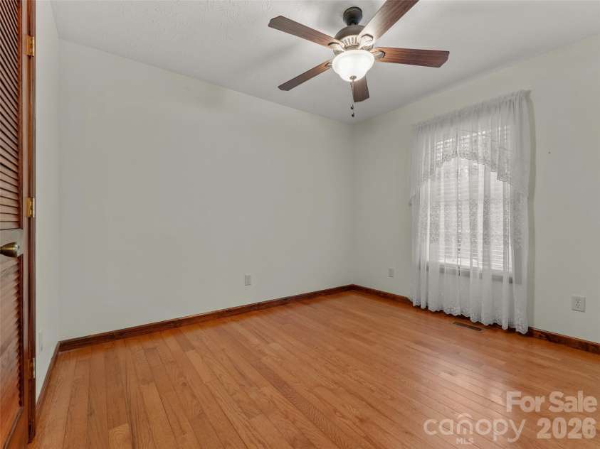 476 Jackson Loop Road, Flat Rock, NC 28731.  MLS# CAR4363362, YatesRealty ID 20386. Bedroom