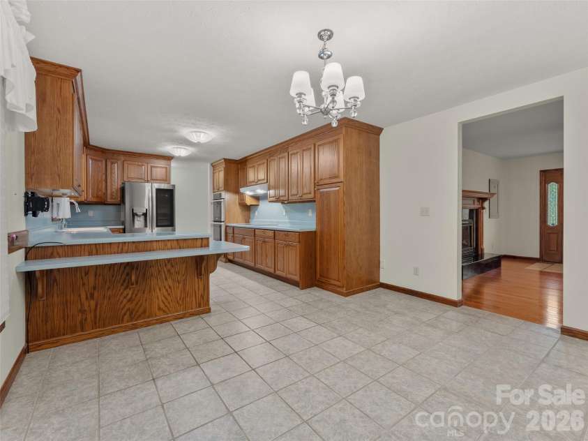 476 Jackson Loop Road, Flat Rock, NC 28731.  MLS# CAR4363362, YatesRealty ID 20386. Breakfast Bar/ Dining Area