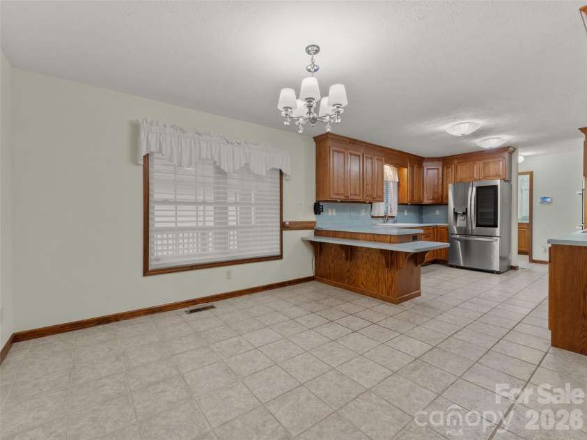 476 Jackson Loop Road, Flat Rock, NC 28731.  MLS# CAR4363362, YatesRealty ID 20386. Dining Area