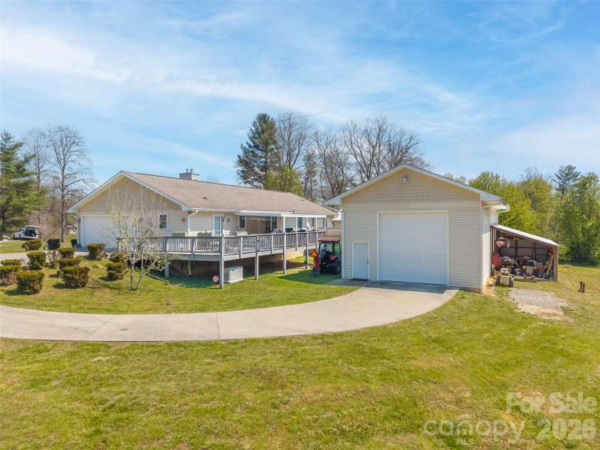 476 Jackson Loop Road, Flat Rock, NC 28731.  MLS# CAR4363362, YatesRealty ID 20386. Drive to RV/ Workshop