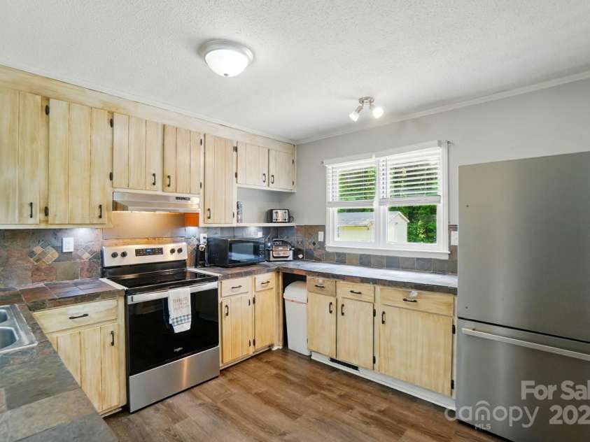 336 Oakwood Drive, Mount Holly, NC 28120.  MLS# CAR4267933, YatesRealty ID 20388. 