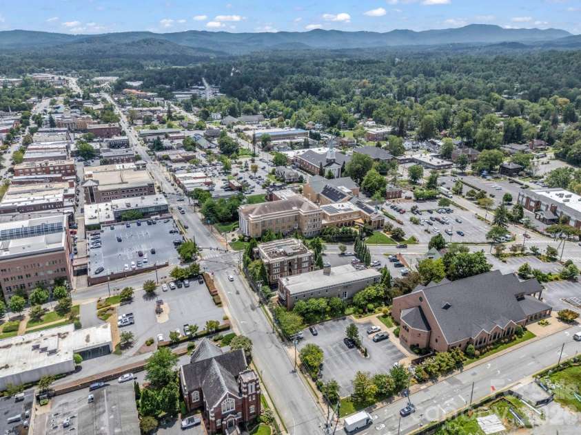 203 6th Avenue, Hendersonville, NC 28739.  MLS# CAR4288242, YatesRealty ID 2039. Sound proof barrier for all your privacy and quiet nights near downtown Hendersonville, 1 block to all you need!