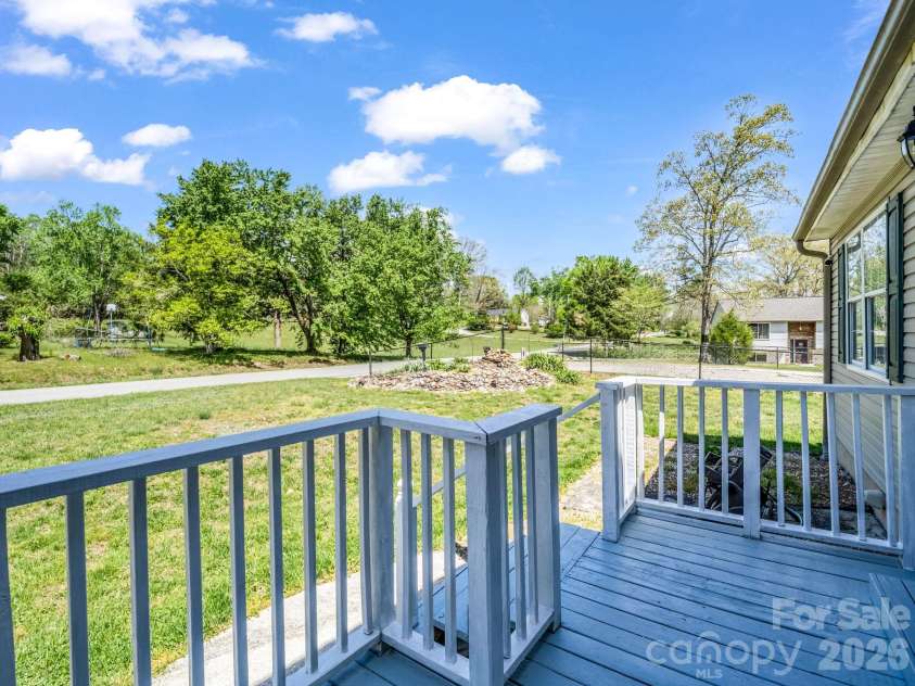 227 Bradshaw Avenue, Hendersonville, NC 28792.  MLS# CAR4370884, YatesRealty ID 20390. Front Deck overlooking the front yard