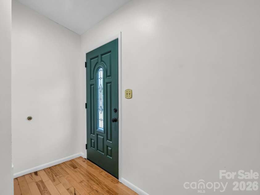 227 Bradshaw Avenue, Hendersonville, NC 28792.  MLS# CAR4370884, YatesRealty ID 20390. Just inside the front door