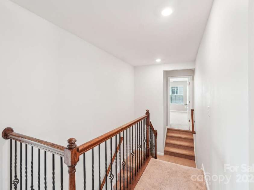 1034 Currituck Way, York, SC 29745.  MLS# CAR4239993, YatesRealty ID 20391. Stairs to bonus room/bedroom 5