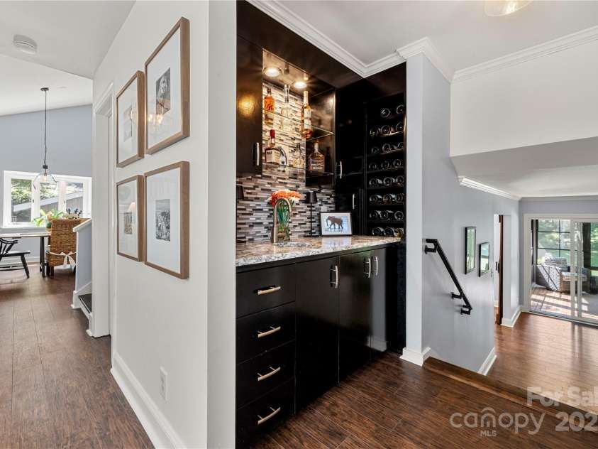 54 Honeysuckle Woods, Clover, SC 29710.  MLS# CAR4255360, YatesRealty ID 20392. Wet bar w/ plenty of wine storage