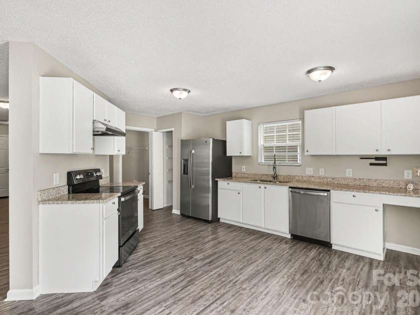 12425 Stowe Acres Drive, Charlotte, NC 28262.  MLS# CAR4378117, YatesRealty ID 20393. 