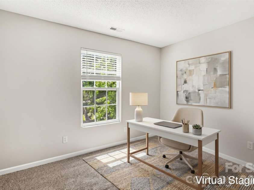 12425 Stowe Acres Drive, Charlotte, NC 28262.  MLS# CAR4378117, YatesRealty ID 20393. Virtually staged