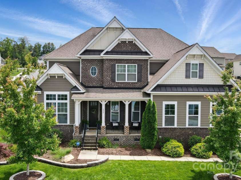 220 Forsythia Lane, Tega Cay, SC 29708.  MLS# CAR4257407, YatesRealty ID 20401. Front of home