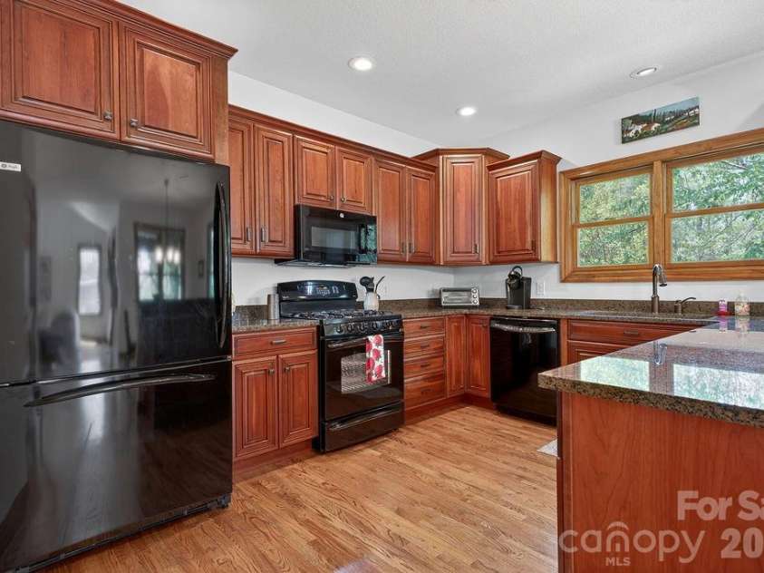 24 Triple Fairways Drive, Hendersonville, NC 28739.  MLS# CAR4372971, YatesRealty ID 20402. 
