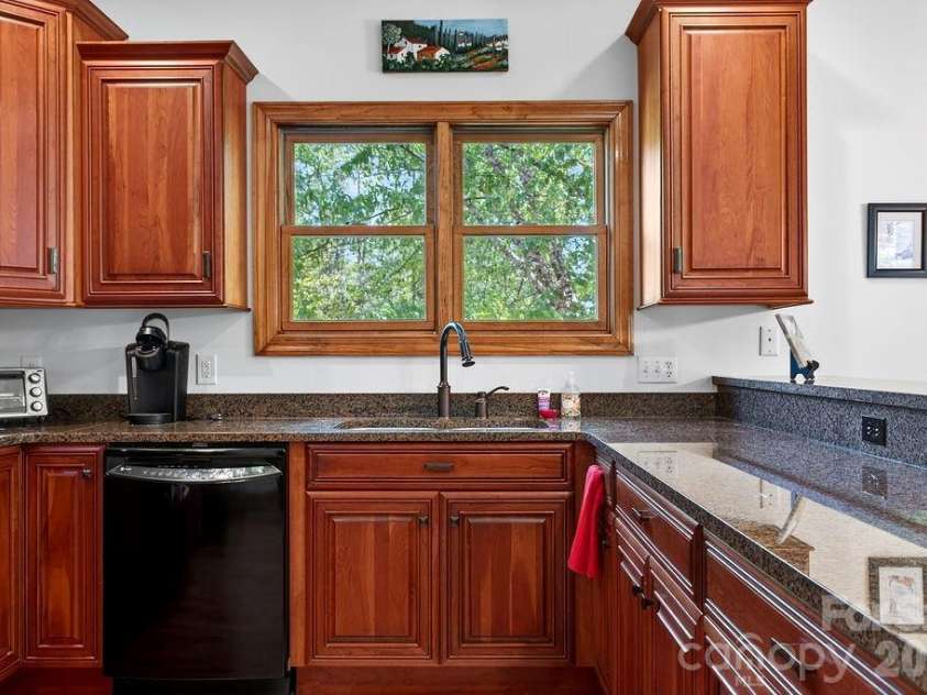 24 Triple Fairways Drive, Hendersonville, NC 28739.  MLS# CAR4372971, YatesRealty ID 20402. 