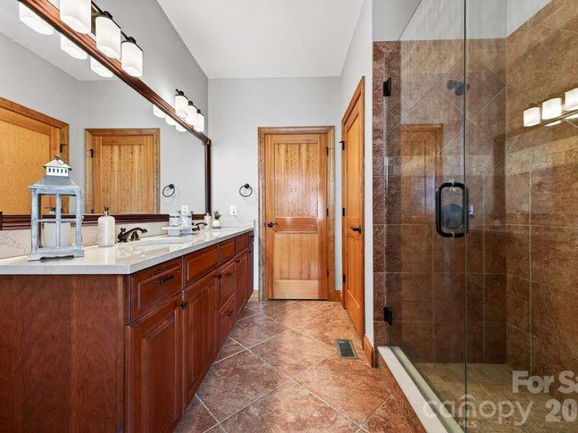 24 Triple Fairways Drive, Hendersonville, NC 28739.  MLS# CAR4372971, YatesRealty ID 20402. 