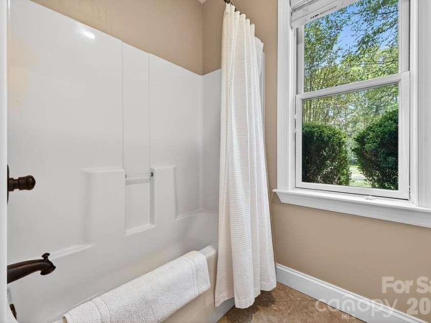 24 Triple Fairways Drive, Hendersonville, NC 28739.  MLS# CAR4372971, YatesRealty ID 20402. 