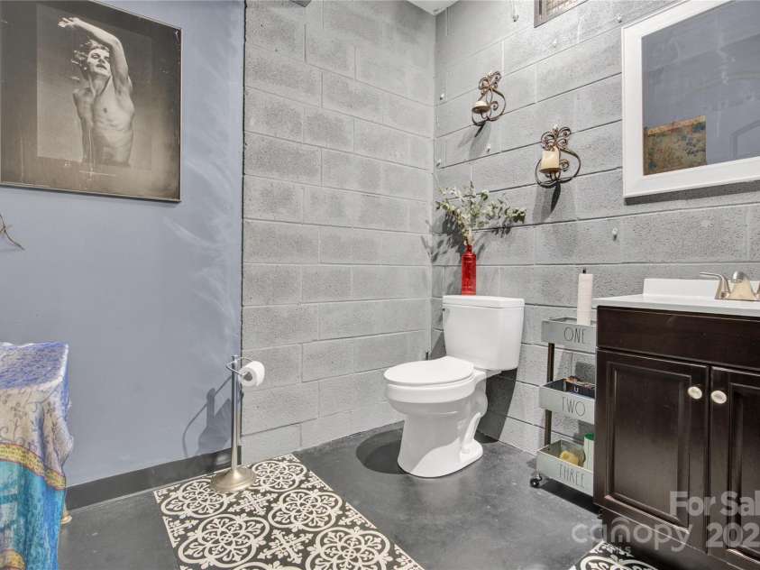 267 Ikerd Drive, Concord, NC 28025.  MLS# CAR4264417, YatesRealty ID 20402. Powder room in the Basement