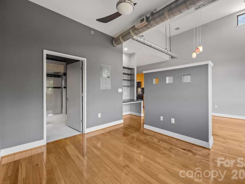 514 10th Street, Charlotte, NC 28202.  MLS# CAR4366152, YatesRealty ID 20407. Upper-level loft space showing modern architectural design and open layout.