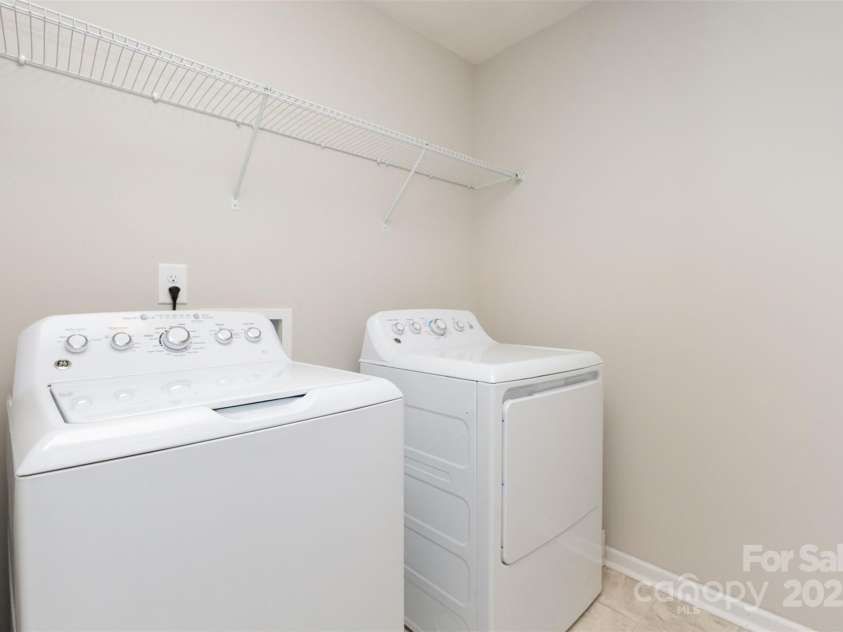 1117 Laurel Woods Drive, Gastonia, NC 28052.  MLS# CAR4270021, YatesRealty ID 20408. 2nd floor laundry room