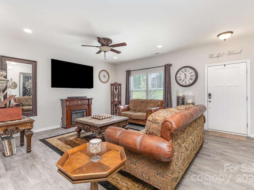 1117 Laurel Woods Drive, Gastonia, NC 28052.  MLS# CAR4270021, YatesRealty ID 20408. Entry into home and living room