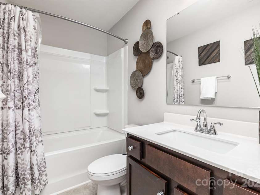 1117 Laurel Woods Drive, Gastonia, NC 28052.  MLS# CAR4270021, YatesRealty ID 20408. Guest bath
