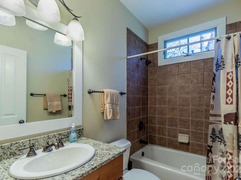 31 Whispering Falls Court, Tuckasegee, NC 28783.  MLS# CAR4234126, YatesRealty ID 2041. 