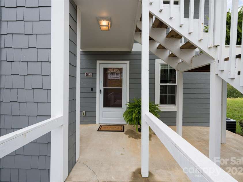 4805 Breakers Lane, Asheville, NC 28806.  MLS# CAR4307390, YatesRealty ID 2041. Entry to Unit 4805 with patio area. 