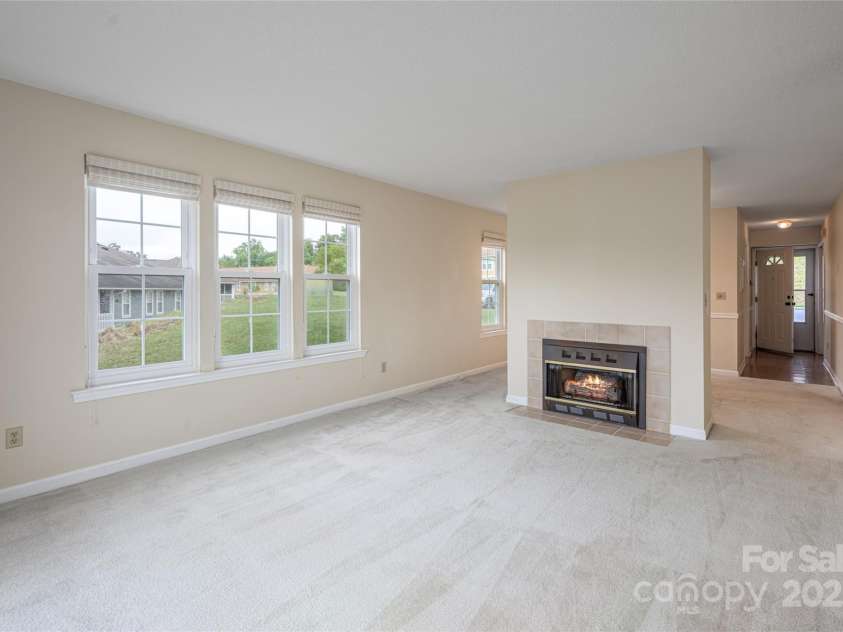 4805 Breakers Lane, Asheville, NC 28806.  MLS# CAR4307390, YatesRealty ID 2041. Gas fireplace.