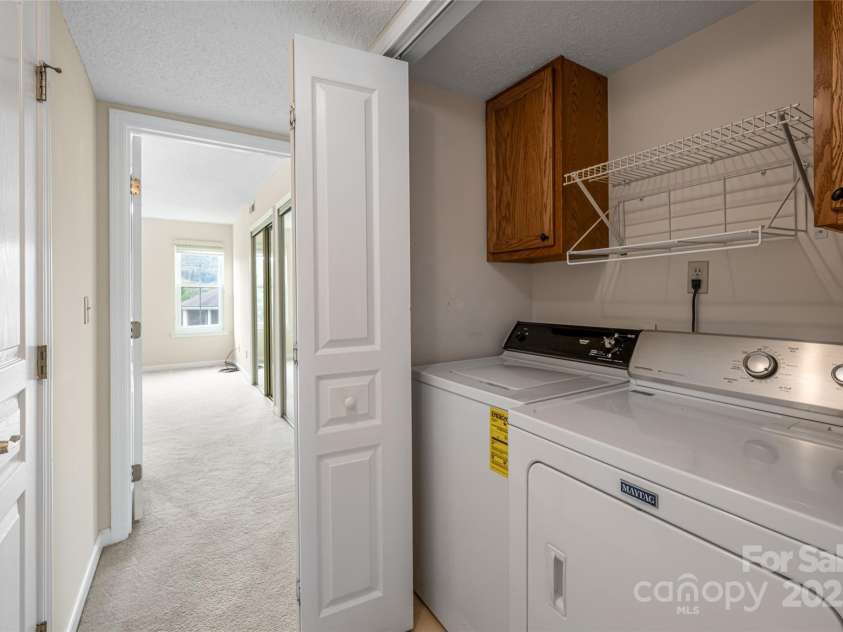 4805 Breakers Lane, Asheville, NC 28806.  MLS# CAR4307390, YatesRealty ID 2041. Laundry closet.