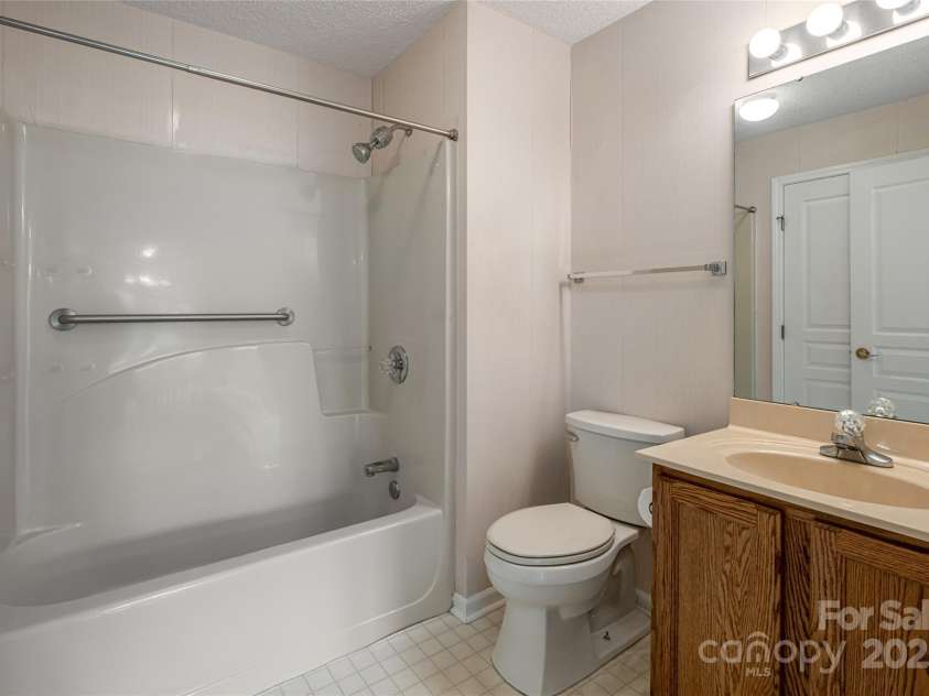 4805 Breakers Lane, Asheville, NC 28806.  MLS# CAR4307390, YatesRealty ID 2041. Main bathroom. 